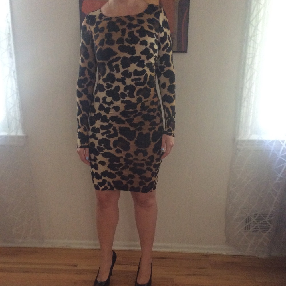 Beautiful cocktail dress with rushing on the side